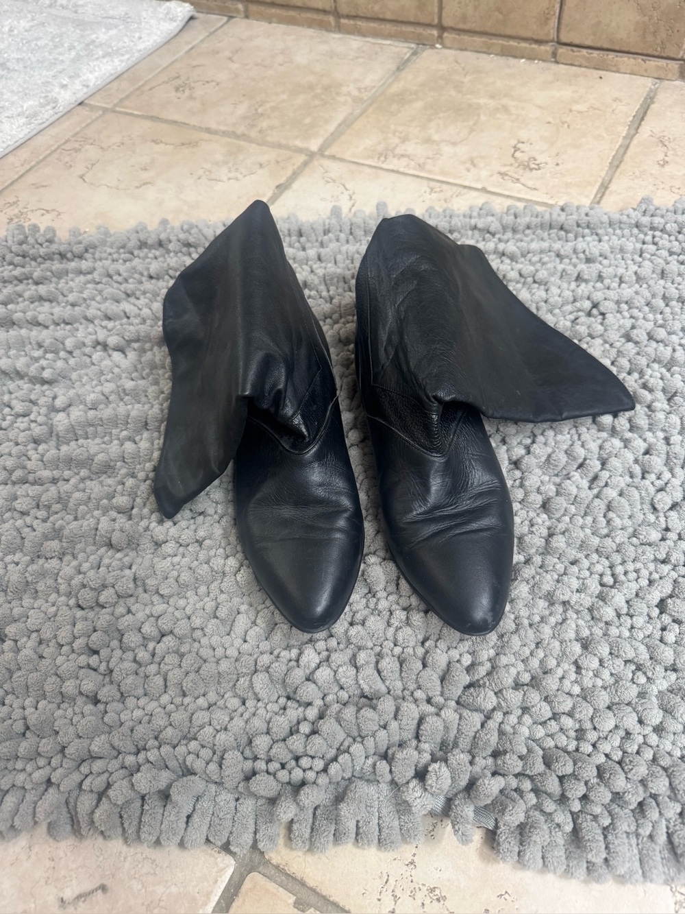 Black leather boots. Mid calf. Made in Argentina. Leather uppers. GUC size 8.